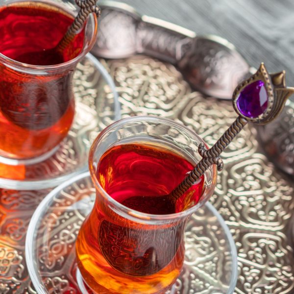 Turkish tea in traditional glass. creative photo